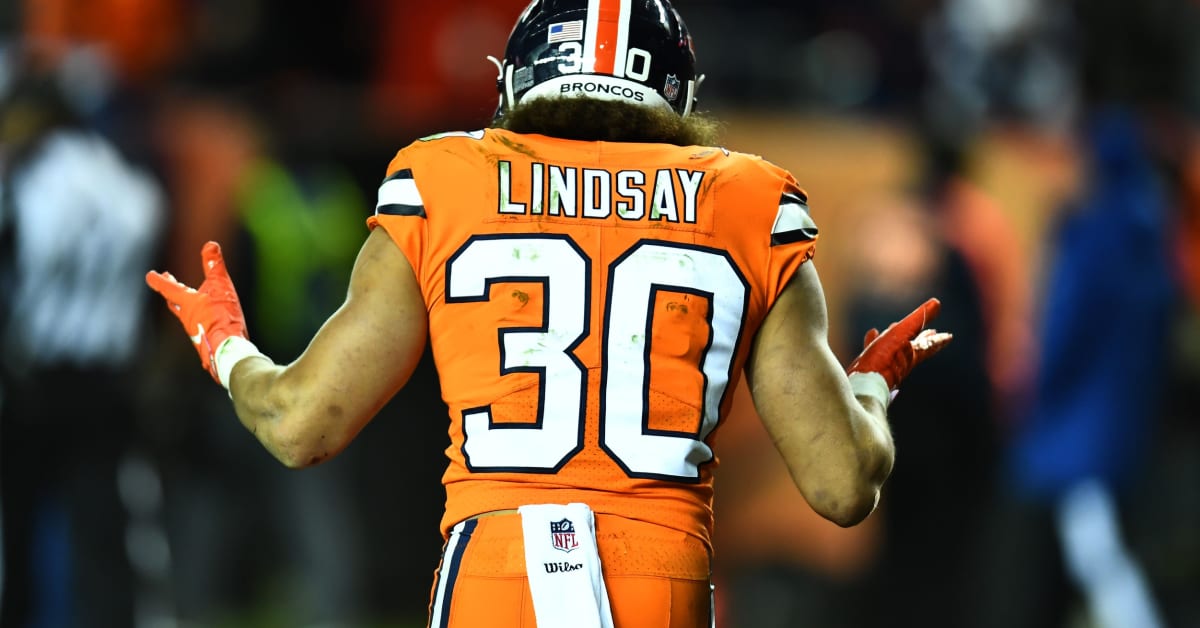 November 03, 2019: Denver Broncos running back Phillip Lindsay (30) is  congratulated during a timeout after his 16-yard sealed the win at the end  of the second half of the game between