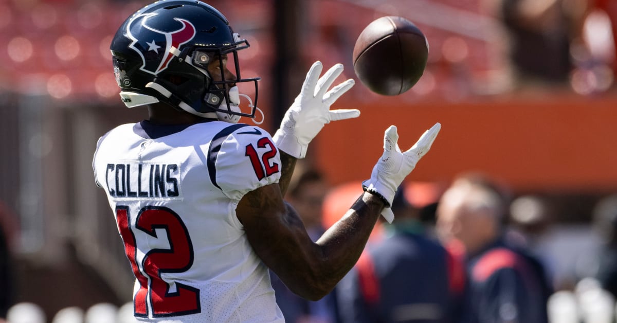 January 9, 2022: Houston Texans wide receiver Nico Collins (12) carries the  ball after a catch during an NFL game between the Texans and the Titans on  Jan. 9, 2022 in Houston