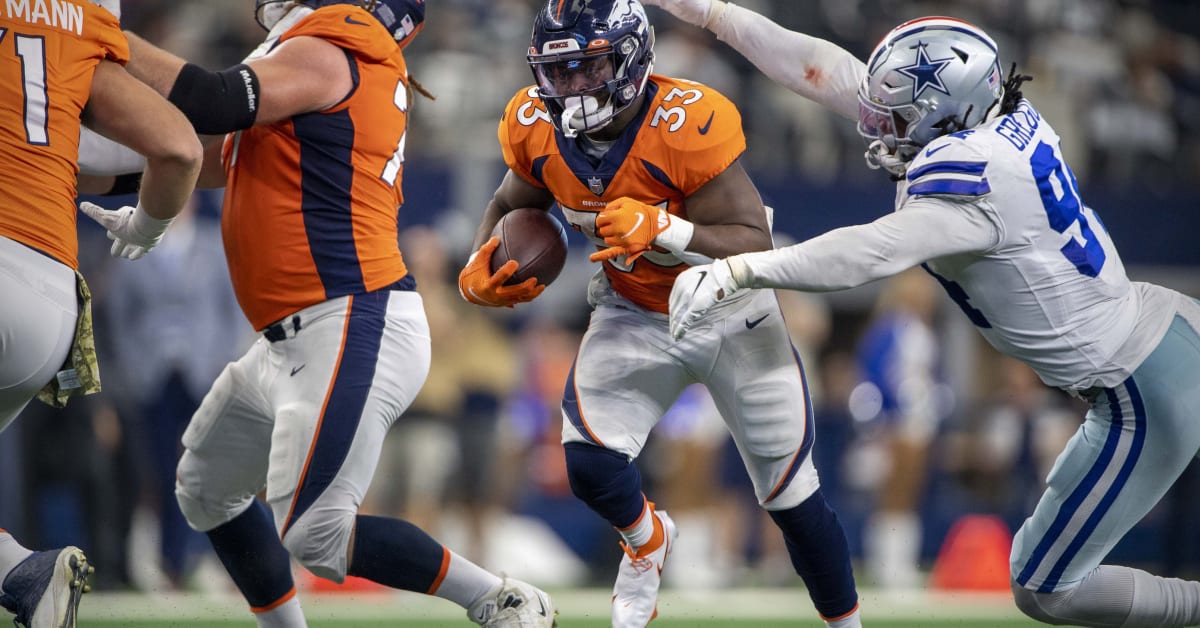 WATCH: Broncos' Javonte Williams powers through Cowboys blockade for  30-yard gain – The Denver Post