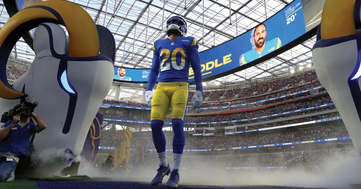 Los Angeles Rams free safety Eric Weddle knocks the ball away from