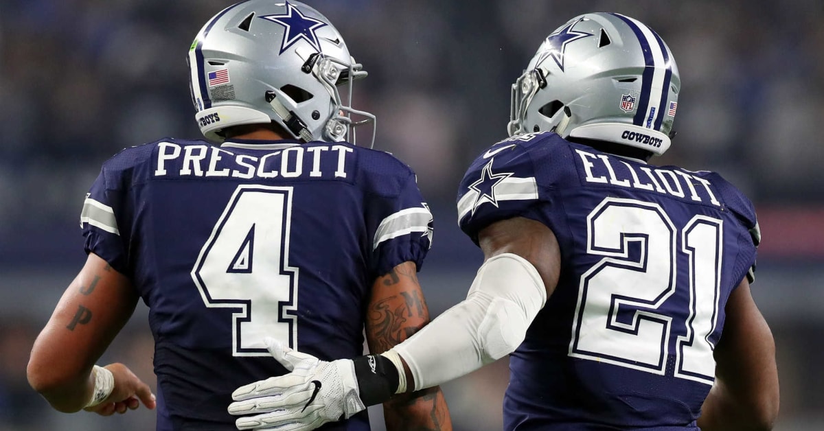 December 18, 2022: Dallas Cowboys quarterback DAK PRESCOTT (4) hands off  the ball to Dallas Cowboys running back EZEKIEL ELLIOTT (21) during the  Jacksonville Jaguars vs Dallas Cowboys NFL game at TIAA