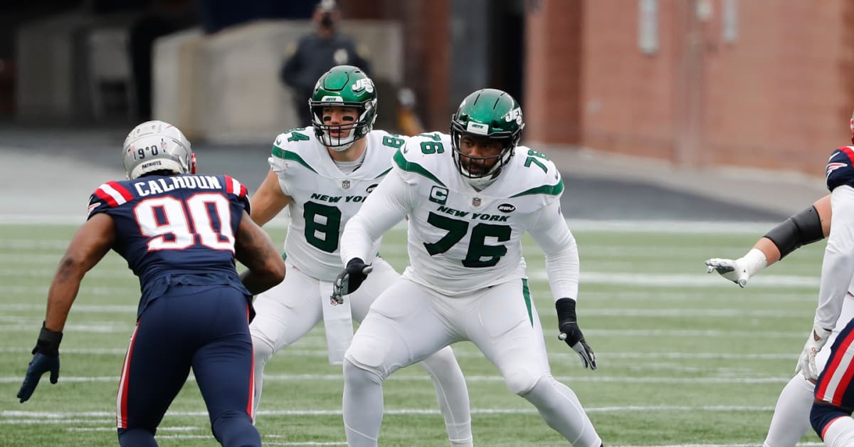 New York Jets offensive tackle George Fant (76) looks to make a block  during an NFL football game against the Cleveland Browns, Sunday, Sept. 18,  2022, in Cleveland. (AP Photo/Kirk Irwin Stock