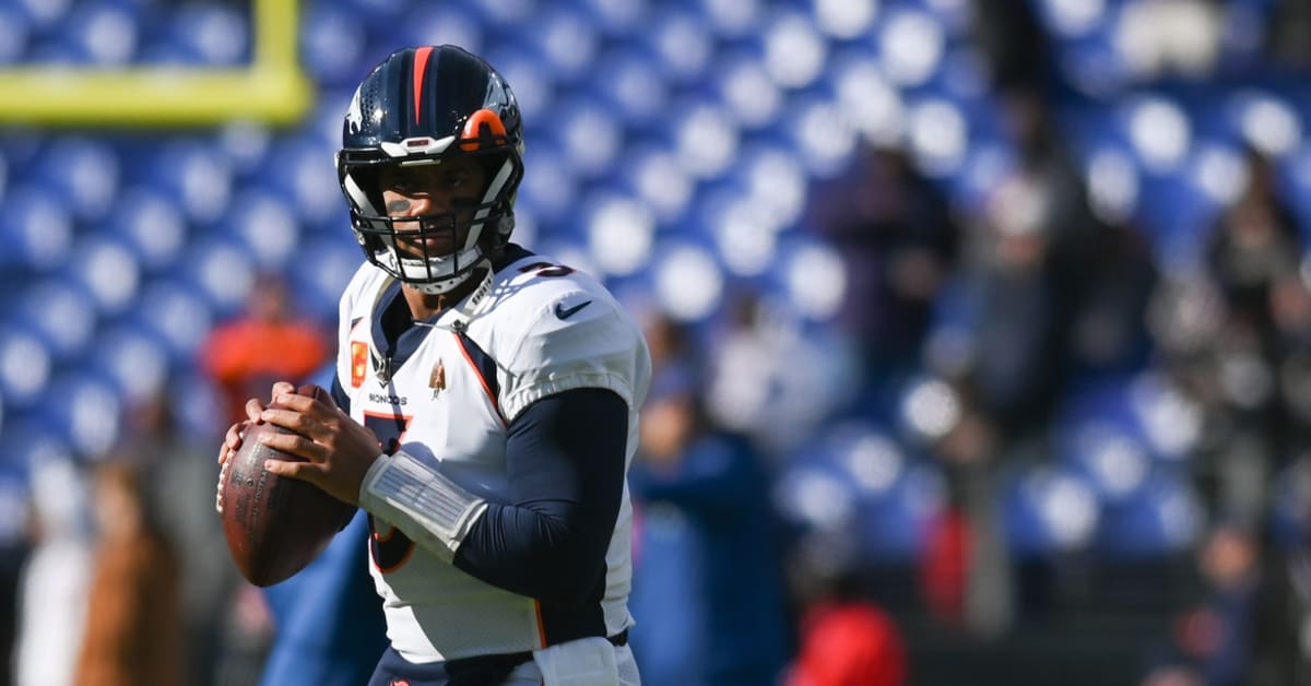 Denver Broncos orange-blue stripe uniform combo returns vs Titans