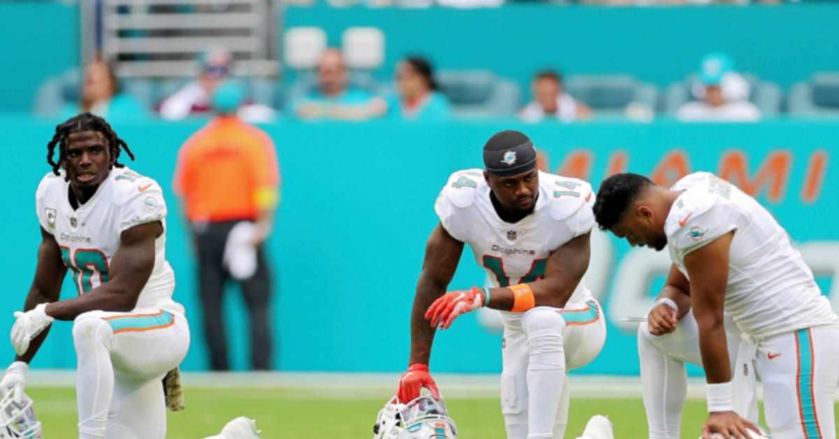 MIAMI GARDENS, FL - DECEMBER 25: Miami Dolphins wide receiver Trent  Sherfield (14) flexes in celebra