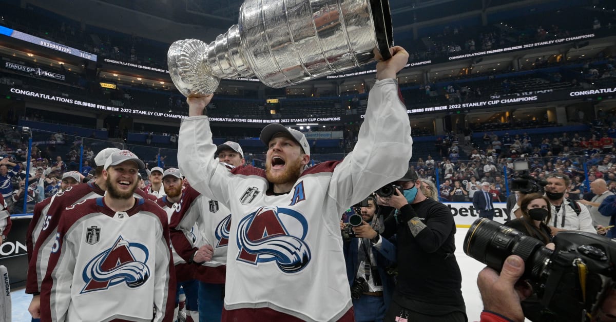 People consider merchandise while shopping at the team store Ball Arena,  Monday, June 27, 2022, in Denver after the Colorado Avalanche defeated the Tampa  Bay Lightning in Game 6 of the Stanley