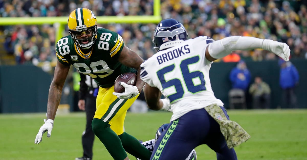 Seattle Seahawks linebacker Jordyn Brooks (56) looks downfield during an NFL  football game against the Las