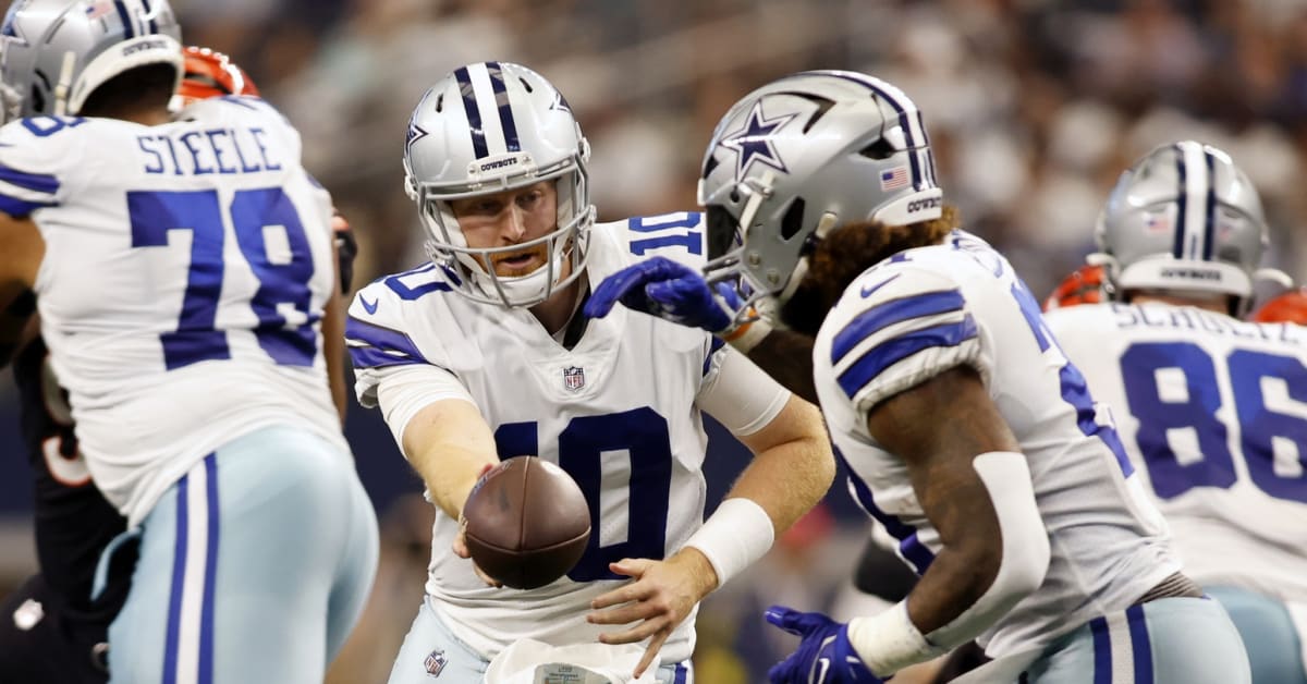 PHILADELPHIA, PA - OCTOBER 16: Dallas Cowboys Quarterback Cooper Rush (10)  hands off the ball to Dallas Cowboys Running Back Ezekiel Elliott (21)  during the second half of the National Football League