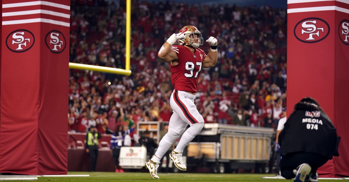 San Francisco 49ers defensive end Nick Bosa tosses his gloves to fans after  the 49ers defeated the Los Angeles Rams 30-23 in an NFL football game  Sunday, Sept. 17, 2023, in Inglewood