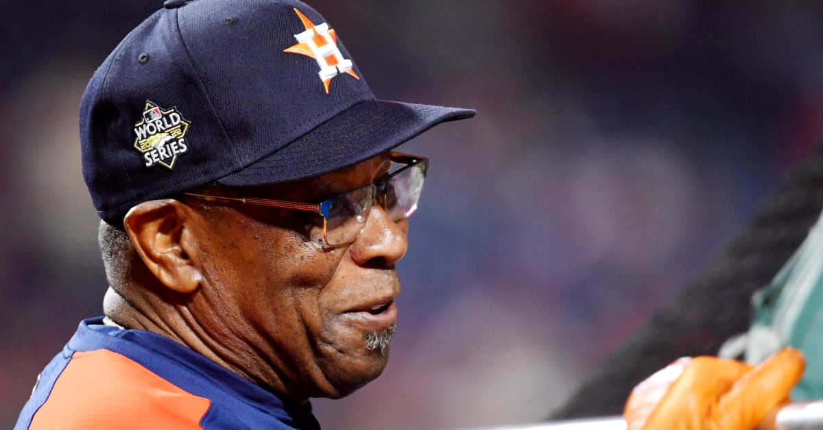 Astros Players Swarm Dusty Baker After He Captures First World Series Title  - Sports Illustrated