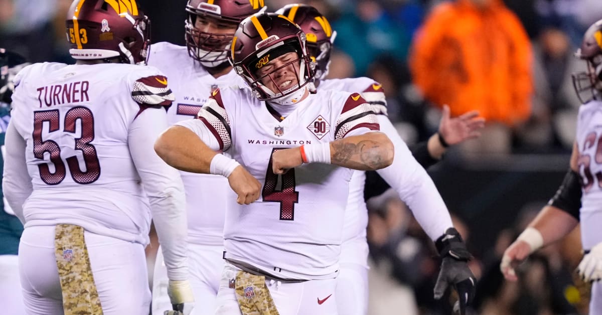 Commanders' Taylor Heinicke rocks iced out chains on team plane