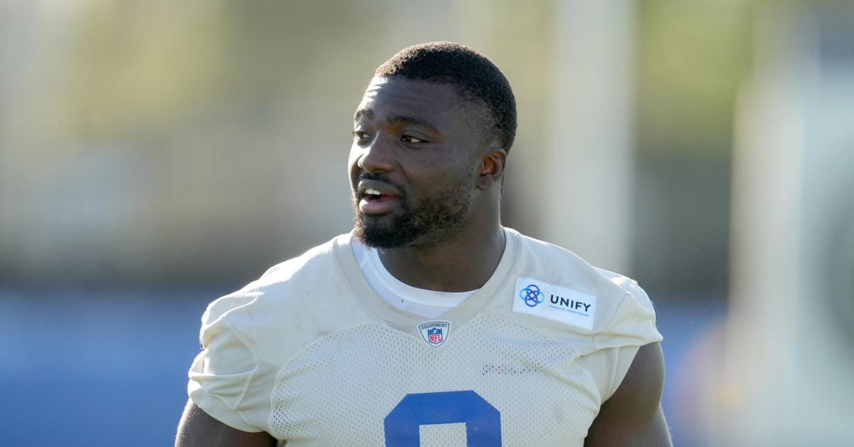 Los Angeles Rams linebacker Byron Young (0) runs during the first half of  an NFL preseason