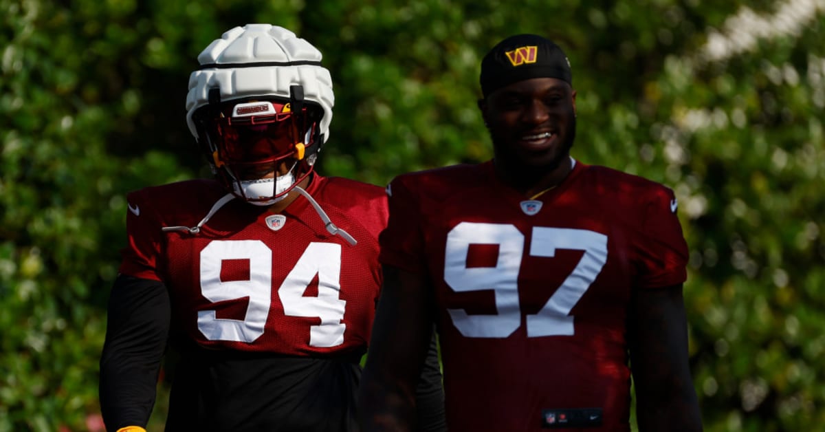 Washington Commanders defensive end Efe Obada (97) runs during an