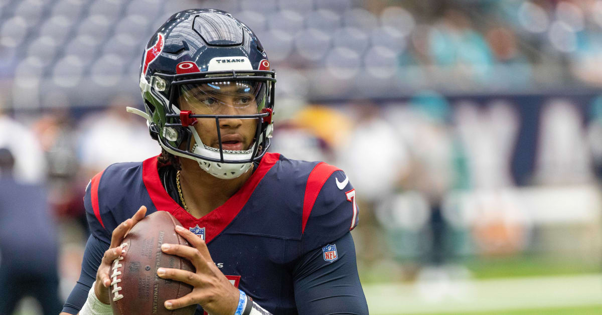 New Orleans, USA. 27th Aug, 2023. Houston Texans quarterback C.J. Stroud  (7) attempts a pass while facing a heavy pass rush from New Orleans Saints  defensive ends Tanoh Kpassagnon (92) and Carl