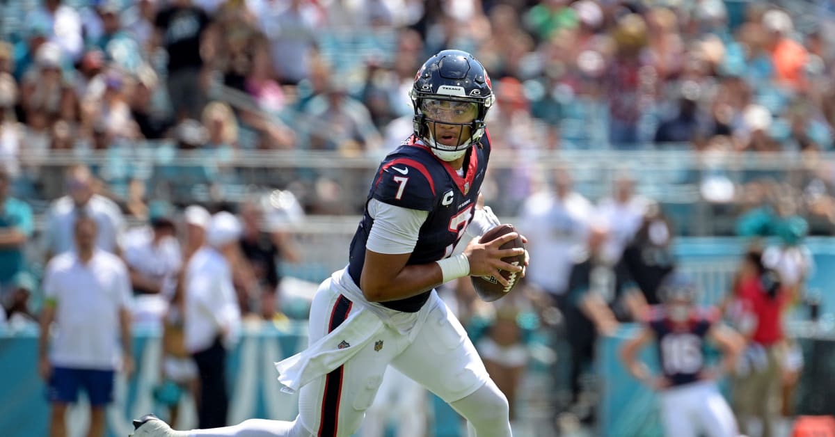 New Orleans, USA. 27th Aug, 2023. Houston Texans quarterback C.J. Stroud  (7) attempts a pass while facing a heavy pass rush from New Orleans Saints  defensive ends Tanoh Kpassagnon (92) and Carl