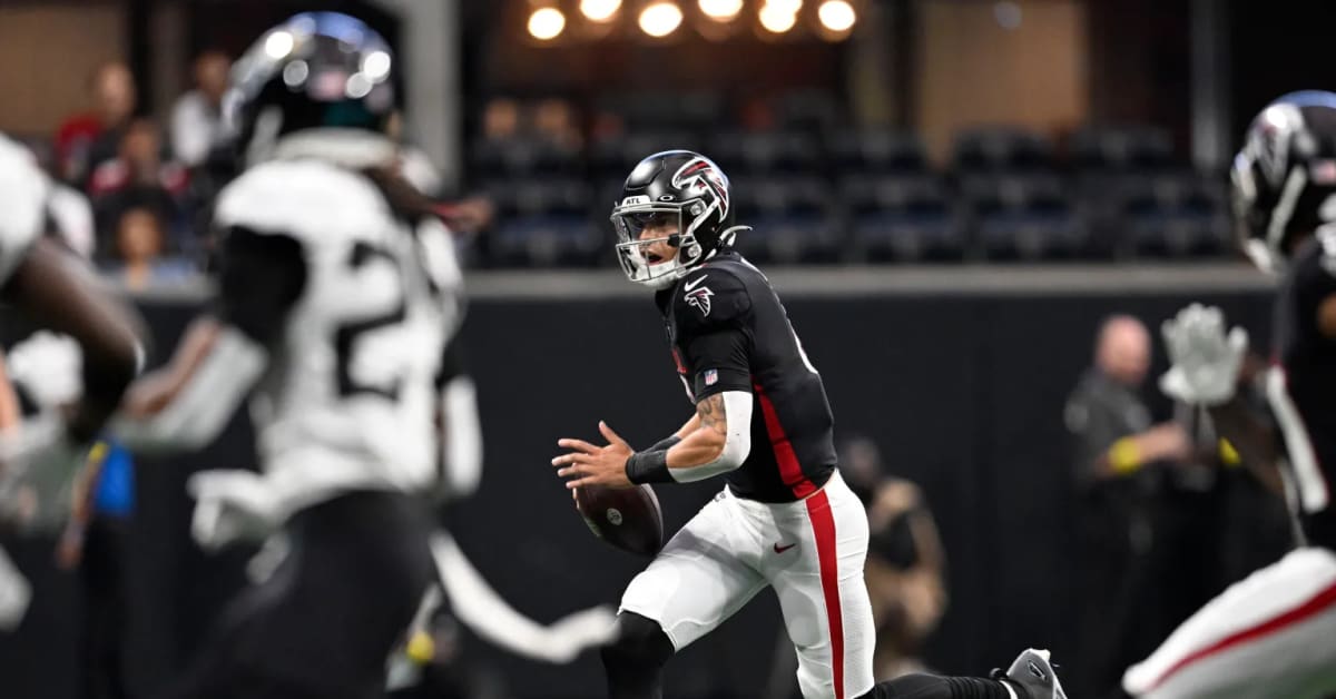 Atlanta Falcons quarterback Desmond Ridder (4) lines up during the second  half of an NFL football game against the Jacksonville Jaguars, Saturday,  Aug. 27, 2022, in Atlanta. The Atlanta Falcons won 28-12. (