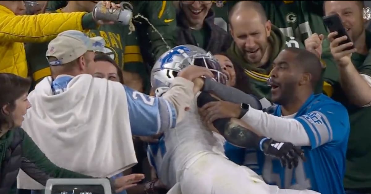 Packers Fan Pours Beer on Amon-Ra St. Brown After Lions TD