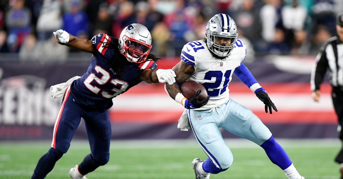 New England Patriots running back Ezekiel Elliott (15) walks on the field  during the first half of a preseason NFL football game against the New  England Patriots Saturday, Aug. 19, 2023, in