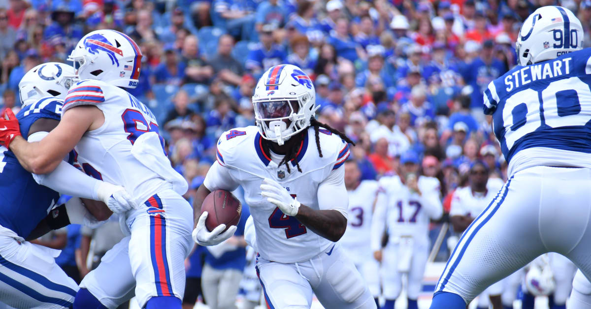 Buffalo Bills running back James Cook (28) runs the ball against the New  York Jets in