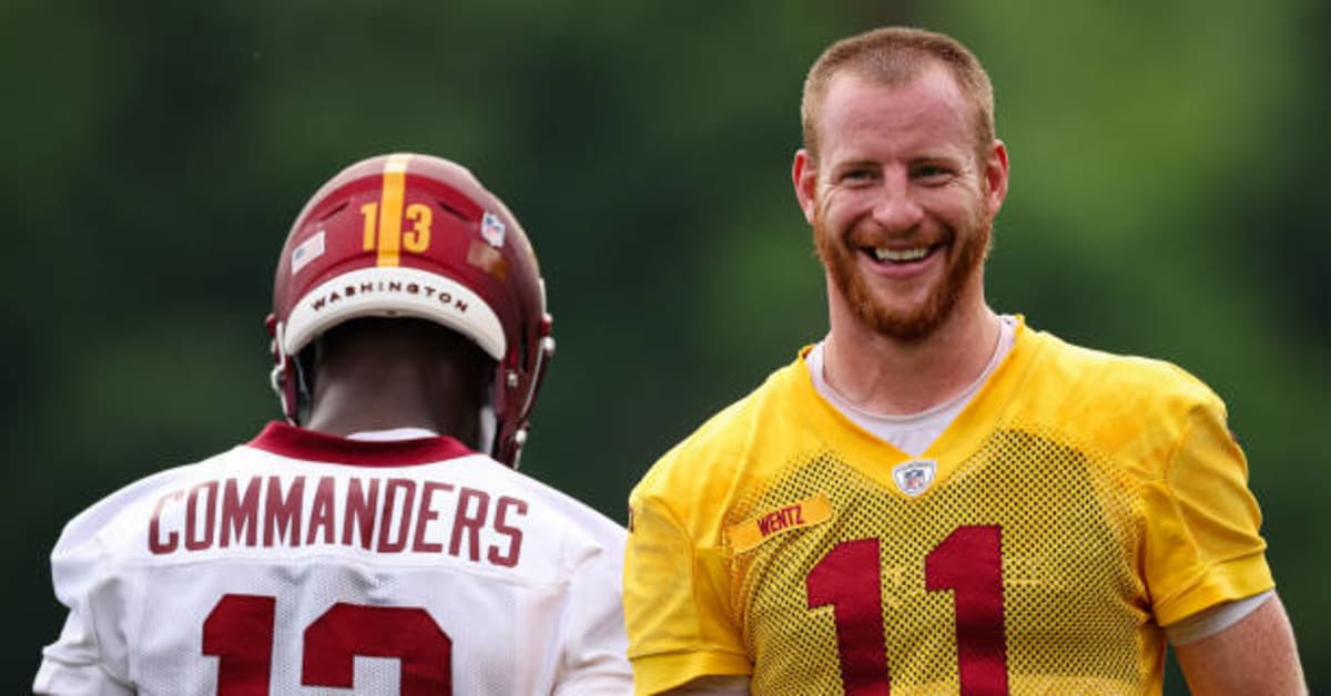 Landover, United States. 13th Aug, 2022. Washington Commanders quarterback  Carson Wentz (11) completes a drill before NFL Preseason game between the  Carolina Panthers vs the Washington Commanders at FedEx Field in Landover