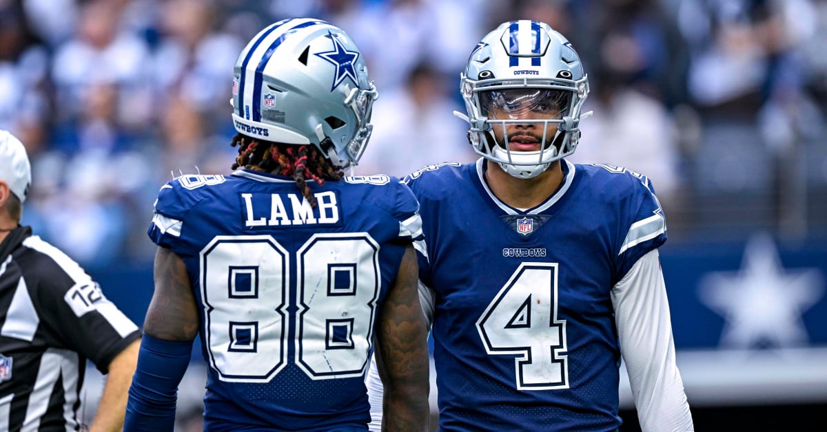 Dallas Cowboys quarterback Dak Prescott (4) celebrates with wide receiver  CeeDee Lamb (88) afte …