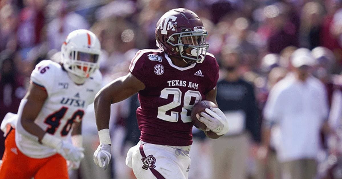 Texas A&M running back Isaiah Spiller runs a drill during the NFL