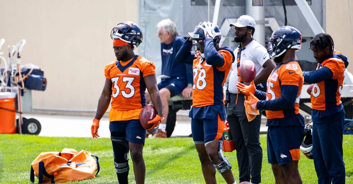 Denver Broncos running back Tyler Badie (36) reacts after scoring