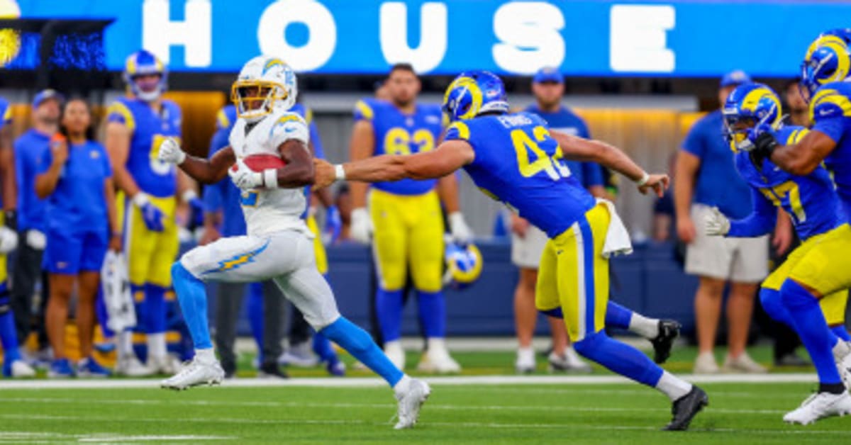 Los Angeles Rams linebacker Jake Hummel intercepts a Raiders pass