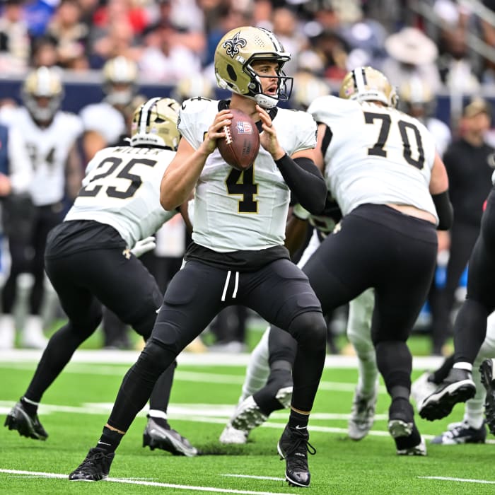 New Orleans Saints quarterback Derek Carr (4) looks to pass the ball