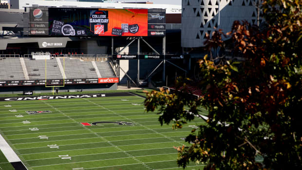 The College GameDay logo is displayed on one of the mega screen at Nippert Stadium at the University of Cincinnati on Friday, Nov. 5, 2021, in Cincinnati. ESPN's College GameDay show will be held in the McMicken Commons on Saturday for the NCAA football game between Cincinnati and Tulsa. College Gameday Setup 27