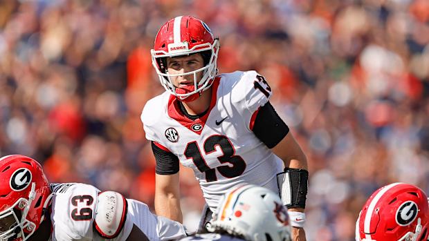 Georgia QB Stetson Bennett looks over the line