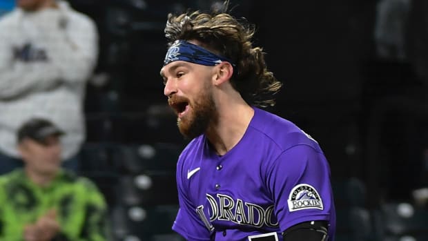 Colorado Rockies second baseman Brendan Rodgers (7) celebrates after hitting a two-run walk off home run in the bottom of the 10th against the Miami Marlins at Coors Field.