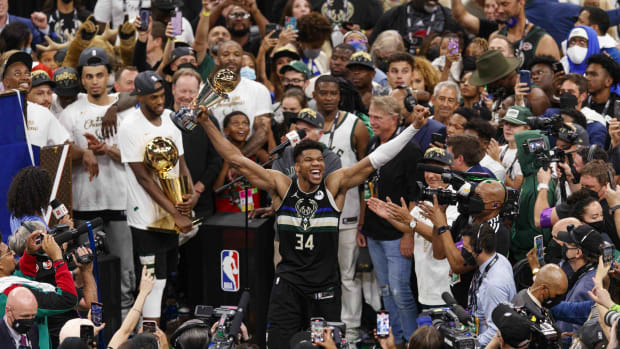 Giannis Antetokounmpo and his brothers recreate iconic photo - Sports  Illustrated Milwaukee Bucks News, Analysis and More