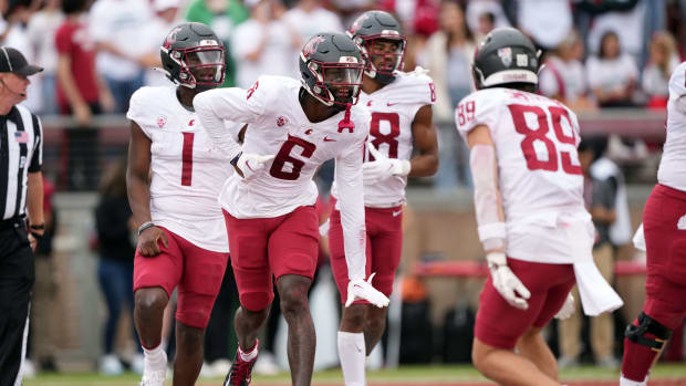 Nov 5, 2022; Stanford, California, USA; Washington State Cougars wide receiver Donovan Ollie (6) celebrates with wide receiver Leyton Smithson (89) after catching a touchdown pass against the Stanford Cardinal during the second quarter at Stanford Stadium. Mandatory Credit: Darren Yamashita-USA TODAY Sports