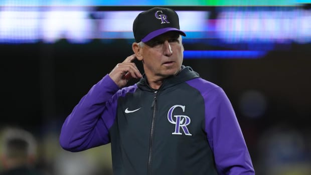 Rockies manager Bud Black looks on while walking off the field during a game.