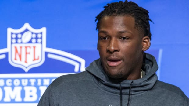 Wisconsin defensive lineman Keeanu Benton speaks with the media at the NFL combine.