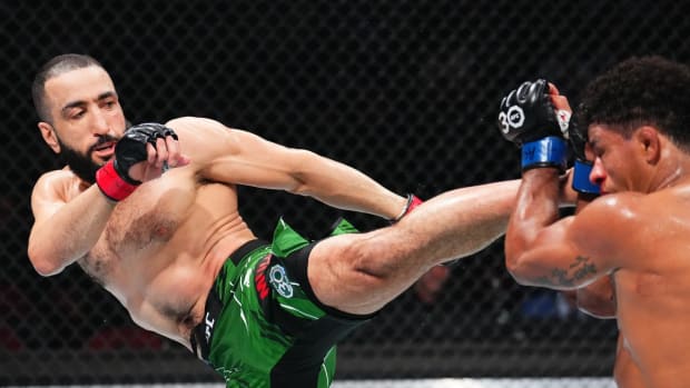 Belal Muhammad throws a kick at Gilbert Burns during their UFC 288 bout inside the Prudential Center in Newark, New Jersey.