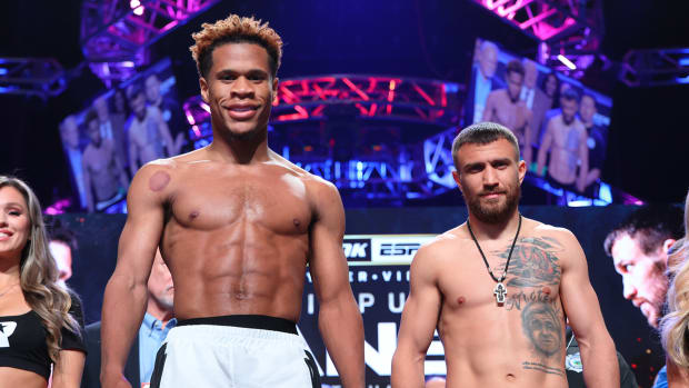 Devin Haney and Vasiliy Lomachenko posed at the weigh-ins ahead of their undisputed lightweight title fight.