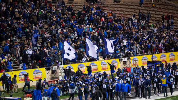 Dec 17, 2022; Albuquerque, New Mexico, USA; Brigham Young Cougars fans celebrate after a touchdown against the Southern Methodist Mustangs at University Stadium (Albuquerque).