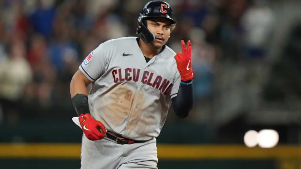 Cleveland Guardians Josh Naylor gestures as he runs the bases after hitting a home run during the third inning of a baseball game against the Texas Rangers in Arlington, Texas, Friday, July 14, 2023. (AP Photo/LM Otero)