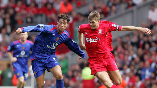 Steven Gerrard (right) and Cristiano Ronaldo (left) pictured in battle during a Premier League game between Liverpool and Manchester United in September 2005