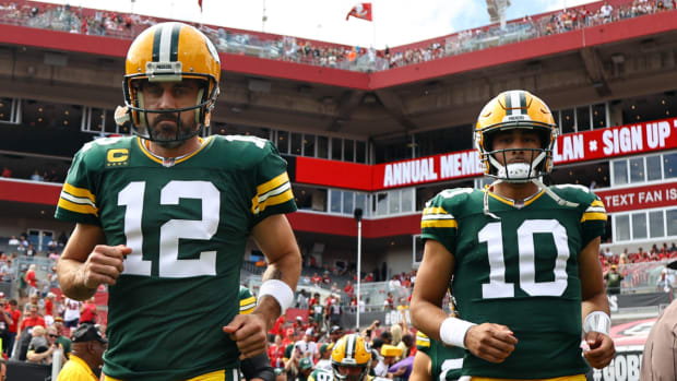 Green Bay Packers center Lucas Patrick (62) passes the ball during the  first half of an NFL football game against the Seattle Seahawks, Sunday,  Nov. 14, 2021, in Green Bay, Wis. (AP