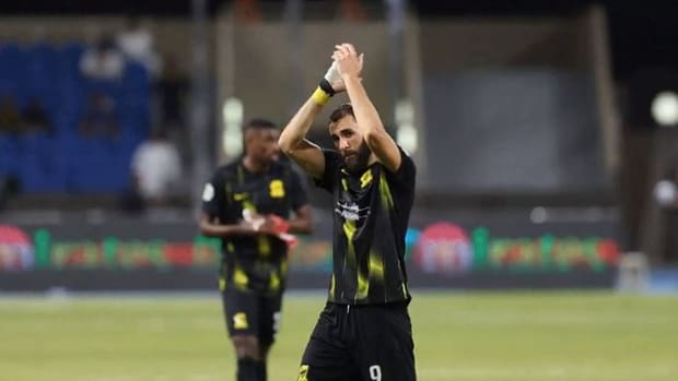 Karim Benzema pictured applauding fans at King Fahd Stadium after scoring in a 1-0 win for Al-Ittihad over Club Sfaxien in July 2023