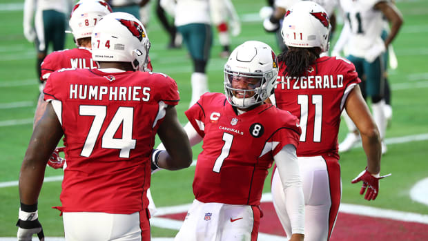 Cardinals quarterback Kyler Murray (1) celebrates with offensive tackle D.J. Humphries (74) after a touchdown.