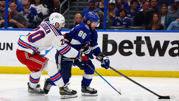 Jun 7, 2022; Tampa, Florida, USA; Tampa Bay Lightning right wing Nikita Kucherov (86) controls the puck against New York Rangers left wing Chris Kreider (20) in the third period in game four of the Eastern Conference Final of the 2022 Stanley Cup Playoffs at Amalie Arena.