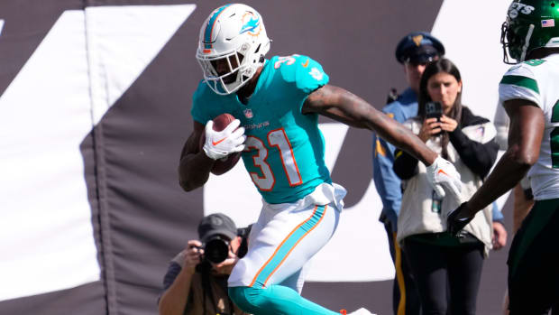 Miami Dolphins guard Solomon Kindley (66) smiles as he walks back to the  locker room at half time during an NFL football game against the  Indianapolis Colts, Sunday, Oct. 3, 2021, in