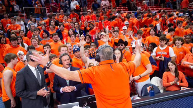 Auburn Tigers head coach Bruce Pearl pumps up the crowd after the game as Auburn Tigers take on Alabama Crimson Tide at Neville Arena in Auburn, Ala., on Wednesday, Feb. 7, 2024. Auburn Tigers defeated Alabama Crimson Tide 99-81.