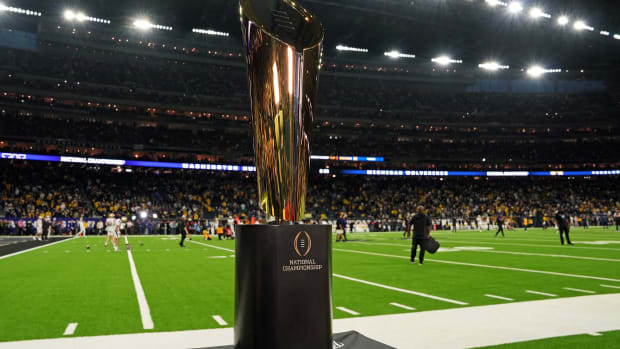 A view of the CFP Trophy before the 2024 College Football Playoff national championship game between the Michigan Wolverines and the Washington Huskies at NRG Stadium.