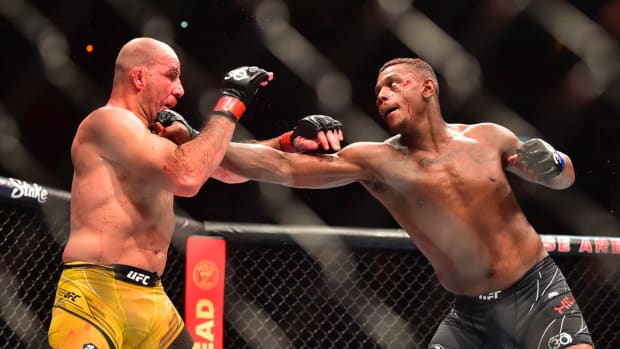 Jan 21, 2023; Rio de Janeiro, Brazil; Glover Teixeira (red gloves) fights Jamahal Hill (blue gloves) during UFC 283 at Jeunesse Arena. Mandatory Credit: Jason da Silva-USA TODAY Sports