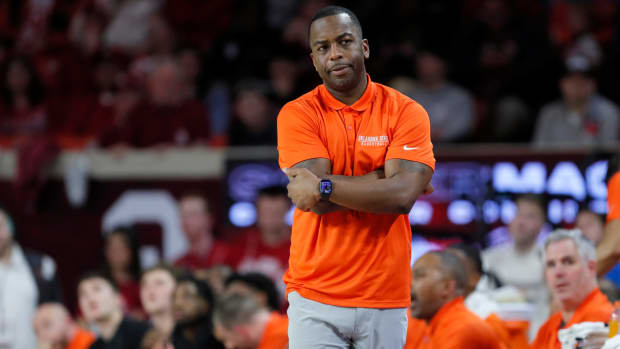 Oklahoma State coach Mike Boynton watches his team during a Bedlam college basketball game between the University of Oklahoma Sooners (OU) and the Oklahoma State Cowboys (OSU) at Lloyd Noble Center in Norman, Okla., Saturday, Feb. 10, 2024. Oklahoma won 66-62.