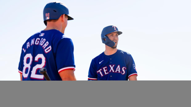 Texas Rangers rising star Evan Carter, right, and Wyatt Langford, left, are rated as MLB's No. 5 and No. 6 top prospects in MLB Pipeline's preseason rankings.